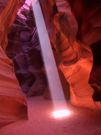 Photo of the well know shaft of light in upper Antelope Canyon Arizona taken on a custom tour with Tour The Southwest